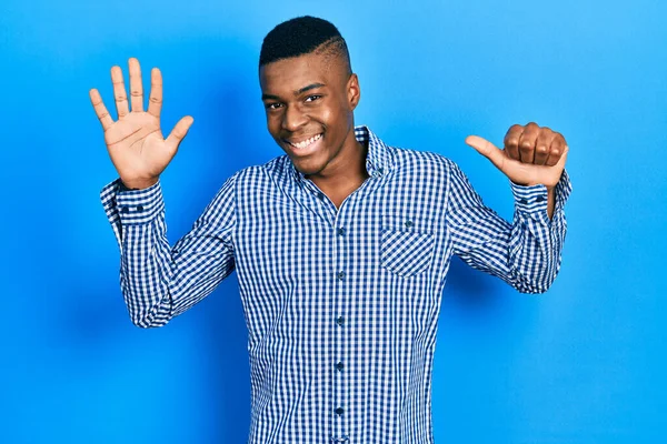 Young African American Man Wearing Casual Clothes Showing Pointing Fingers — Stock Photo, Image