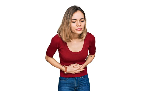 Chica Rubia Joven Que Usa Ropa Casual Con Mano Estómago — Foto de Stock