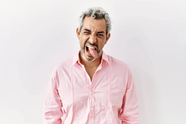Homem Hispânico Meia Idade Sobre Fundo Isolado Furando Língua Feliz — Fotografia de Stock