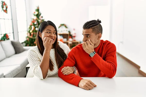 Young Latin Couple Sitting Table Christmas Tree Looking Stressed Nervous — Stock Photo, Image