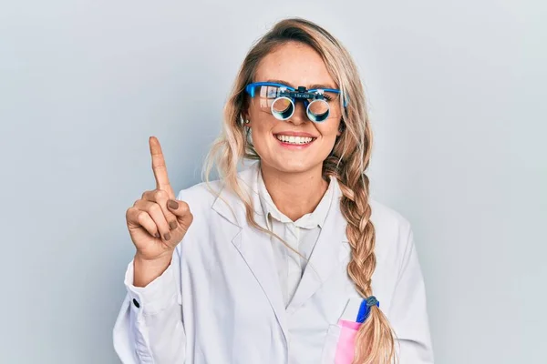 Beautiful Young Blonde Woman Wearing Optometry Glasses Smiling Idea Question — ストック写真