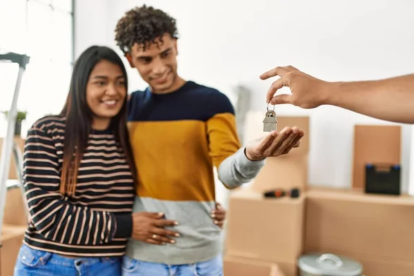 Young Latin Couple Smiling Happy Hugging Holding Key New Home — Stock Photo, Image