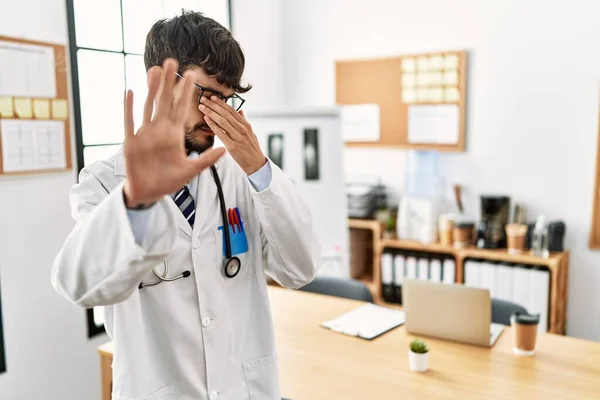 Hispanic Man Beard Wearing Doctor Uniform Stethoscope Office Covering Eyes — Stock Photo, Image