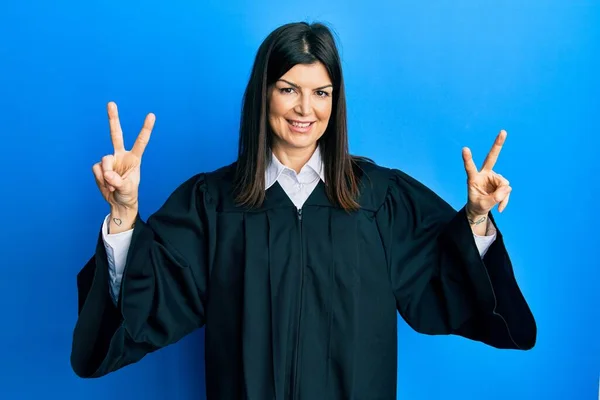 Young Hispanic Woman Wearing Judge Uniform Smiling Looking Camera Showing — Stock Photo, Image