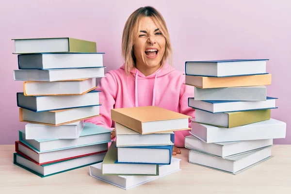 Young Caucasian Woman Sitting Table Books Winking Looking Camera Sexy — Stock Photo, Image