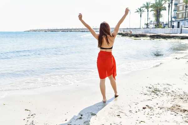 Young Cuacasian Girl Back View Wearing Bikini Hands Raised Beach — Stock Photo, Image