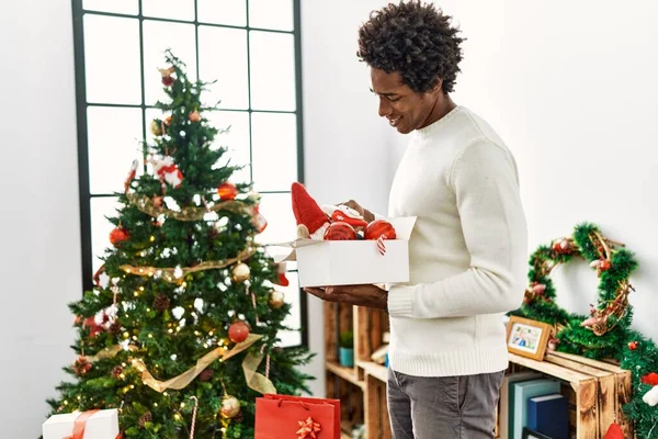 Young African American Man Smiling Happy Decorating Christmas Tree Home — Stock Photo, Image
