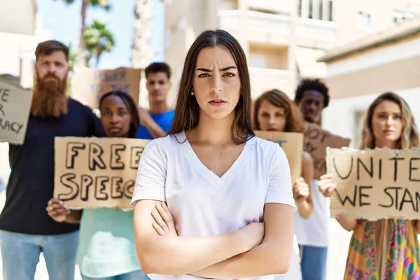 Young Activist Woman Arms Crossed Gesture Standing Group Protesters Holding — Stock Photo, Image