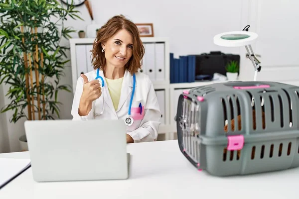 Middle Age Veterinarian Woman Working Pet Clinic Doing Happy Thumbs — Stock Photo, Image