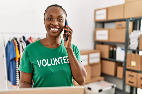 Young African American Volunteer Woman Using Laptop Talking Smartphone Charity — Stock Photo, Image