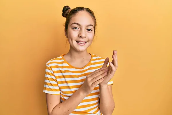 Beautiful Brunette Little Girl Wearing Casual Striped Shirt Clapping Applauding — Stock Photo, Image