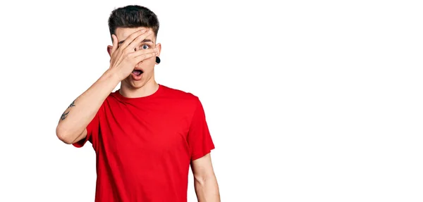 Young Caucasian Boy Ears Dilation Wearing Casual Red Shirt Peeking — Stock Photo, Image