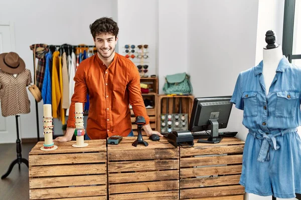 Young Hispanic Shopkeeper Man Smiling Happy Working Clothing Store — Stock Photo, Image