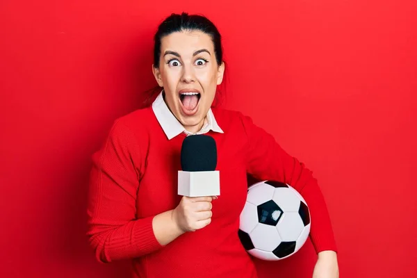 Jeune Femme Hispanique Tenant Microphone Journaliste Ballon Football Célébrant Fou — Photo