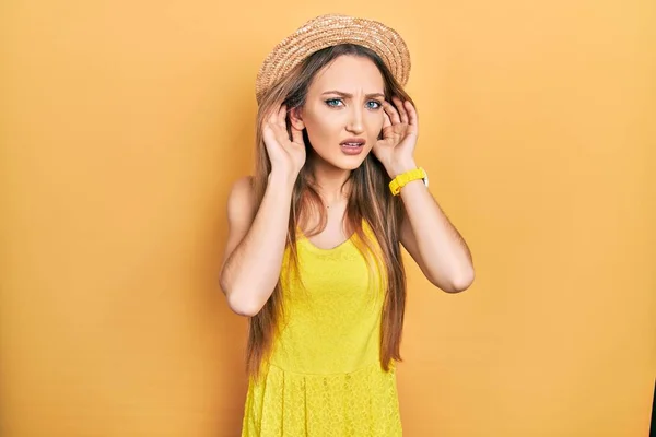 Young Blonde Girl Wearing Summer Hat Trying Hear Both Hands — Stock Photo, Image