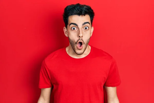 Young Hispanic Man Wearing Casual Clothes Scared Amazed Open Mouth — Stock Photo, Image