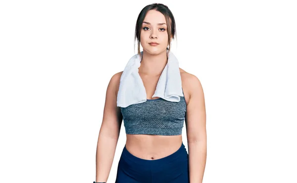 Young Hispanic Girl Wearing Sportswear Towel Relaxed Serious Expression Face — Stock Photo, Image