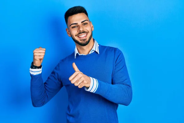 Young Hispanic Man Beard Wearing Casual Blue Sweater Pointing Back — Stock Photo, Image