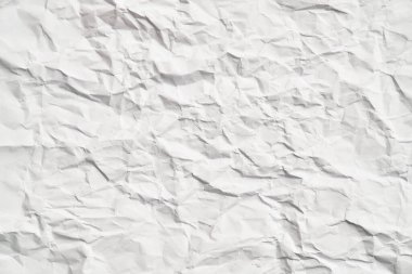 Kırışıklıkları olan beyaz buruşuk kağıt dokusu. Hasarlı ve yırtık çarşaf