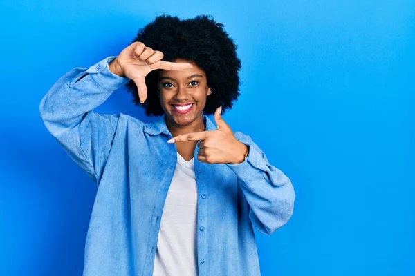 Young African American Woman Wearing Casual Clothes Smiling Making Frame — Stock Photo, Image