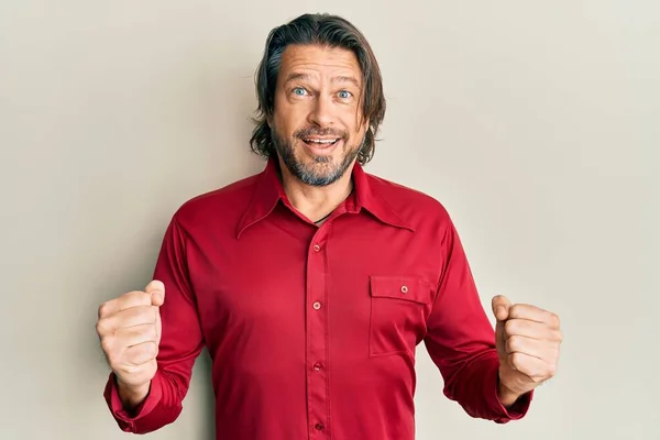 Middle Age Handsome Man Wearing Casual Clothes Celebrating Surprised Amazed — Stock Photo, Image