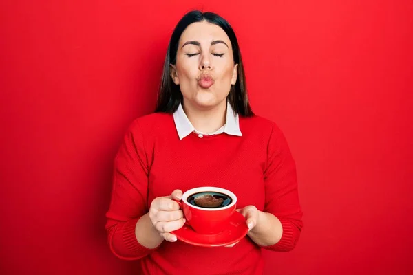 Young Hispanic Woman Drinking Cup Coffee Looking Camera Blowing Kiss — Stock Photo, Image