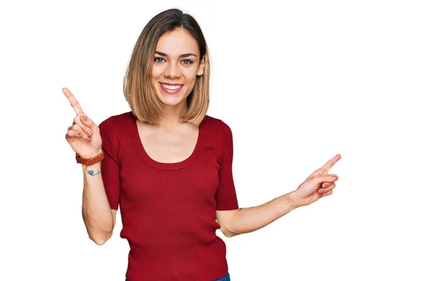 Young Blonde Girl Wearing Casual Clothes Smiling Confident Pointing Fingers — Stock Photo, Image