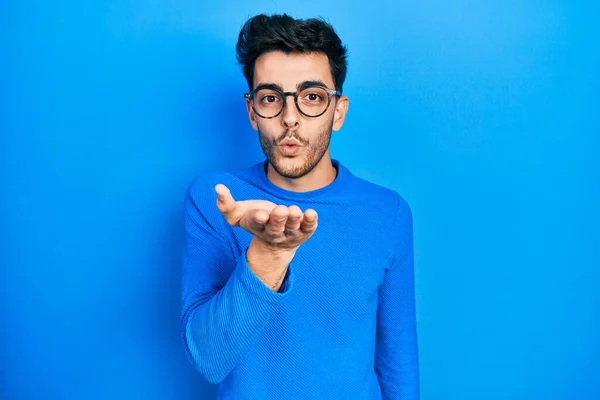 Young Hispanic Man Wearing Casual Clothes Glasses Looking Camera Blowing — Stock Photo, Image