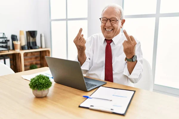 Senior Man Working Office Using Computer Laptop Showing Middle Finger — Stockfoto