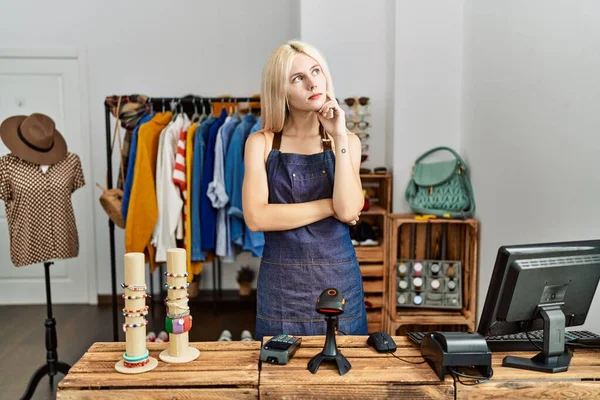 Beautiful Caucasian Woman Working Manager Retail Boutique Serious Face Thinking — Stock Photo, Image