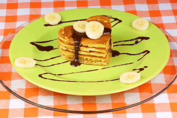 Heart shaped pancakes with chocolate and banana — Stock Photo, Image