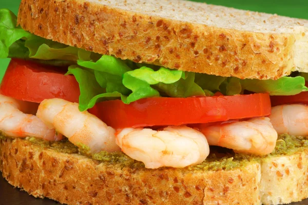 Sandwich with shrimps and pesto