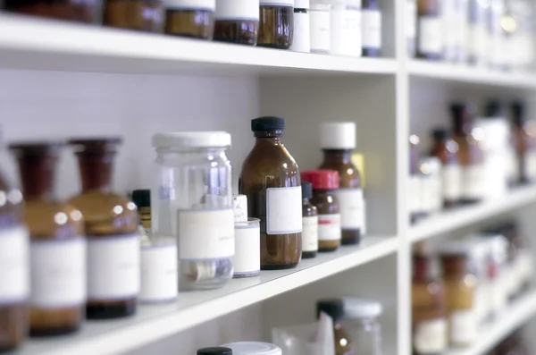 Shelves of chemical bottles — Stock Photo, Image