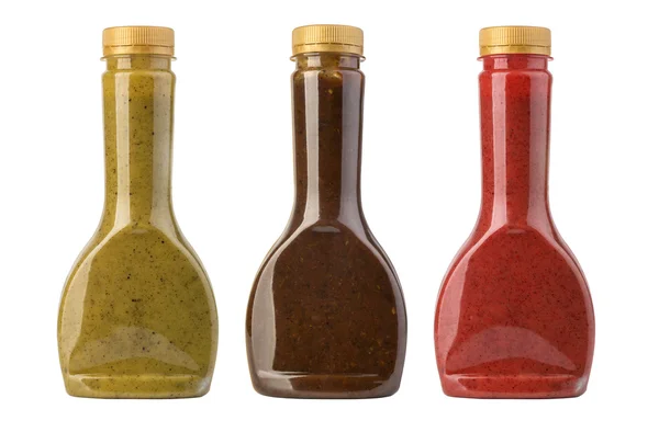 Barbecue sauces in glass bottles — Stock Photo, Image