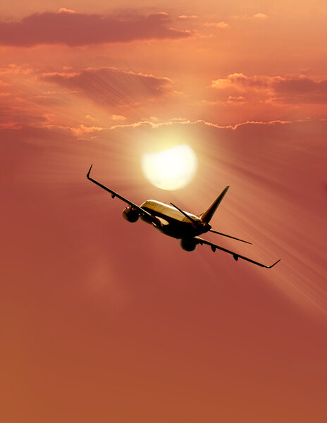 Airplane  at sunset. 