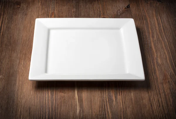 Пустая белая плита — стоковое фото