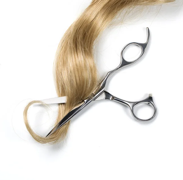 Long blond hair and scissors — Stock Photo, Image