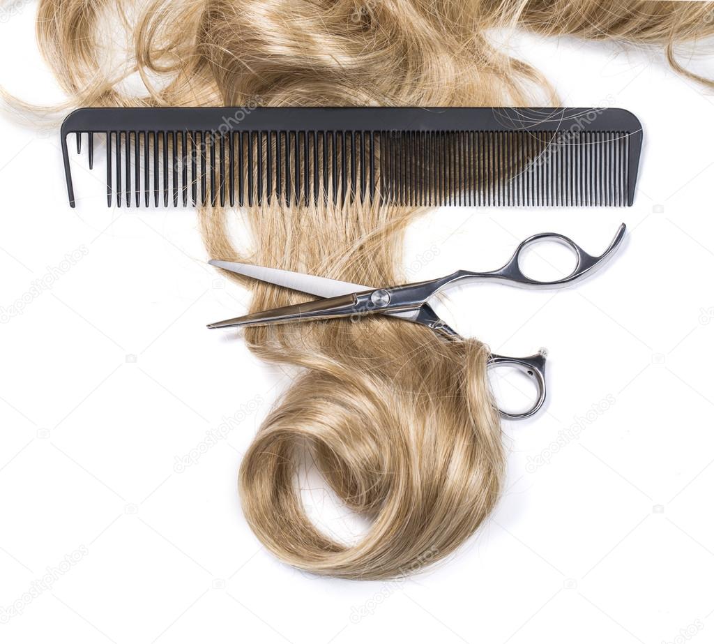  hair with hair cutting shears and comb