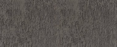 Grey rough concrete wall showing a textured plaster surface