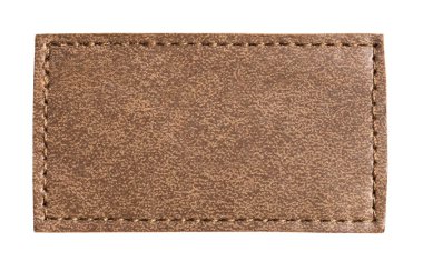 Boş dikdörtgen kahverengi deri yama görünür dikişli, şeffaf bir arkaplan ile izole