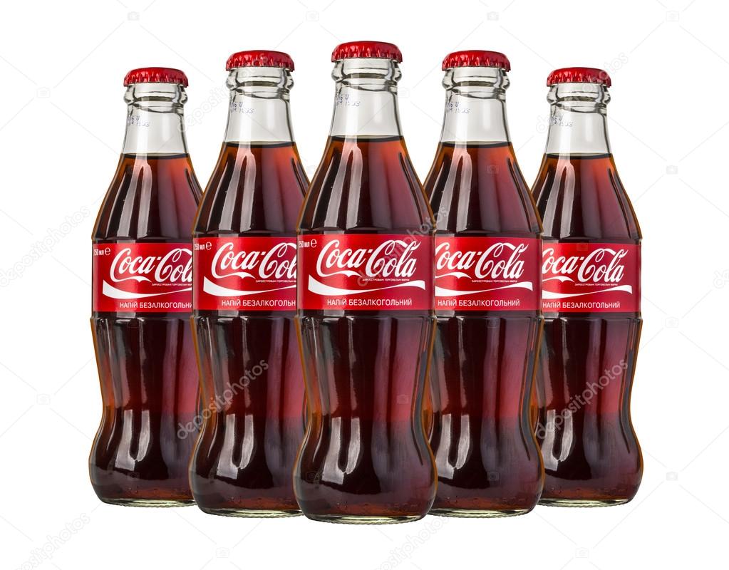 CHISINAU, MOLDOVA - November 14, 2015, Coca-Cola Classic in a glass bottle Isolated on white Background. Coca Cola, Coke is the most popular carbonated soft drink beverages sold around the world