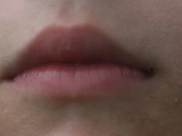 Close up of boys tender lips — Stock Photo, Image