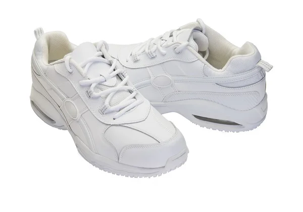 Белые кроссовки — стоковое фото