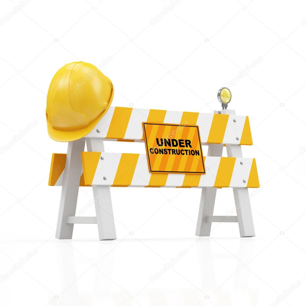 Yellow Safety Helmet on a Road Barrier