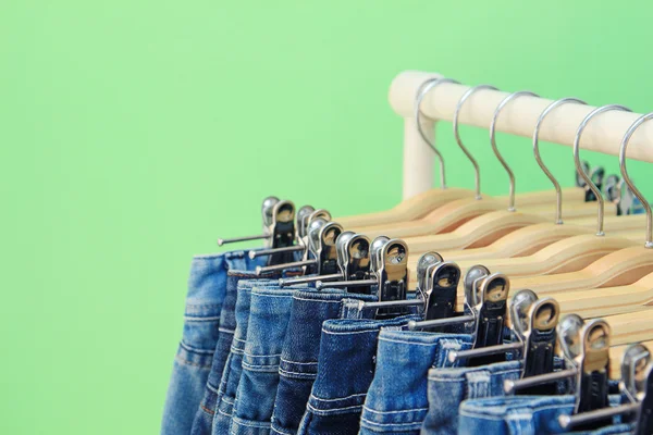 Row of hanged blue jeans — Stock Photo, Image