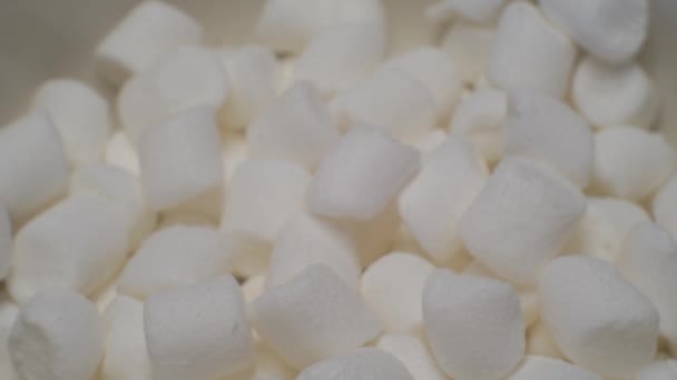 Modern sweet food.background.small marshmallows closeup — Stock Video