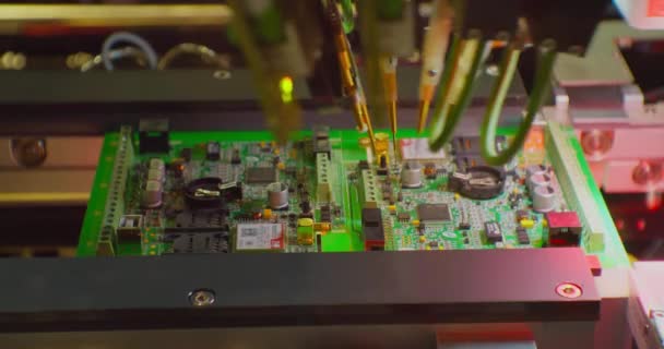 Industrial robot for electronics manufacturing makes a complex printed circuit board. — Stock Video