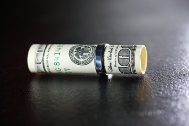 American currency, the dollar collapsed into a tube