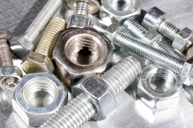 set of wheel nuts, metal parts