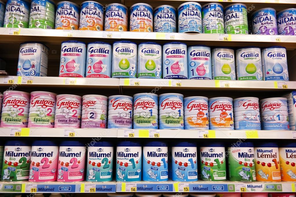FRANCE - JULY 2014  Shelves filled with commercial baby food in a Leclerc hypermarket